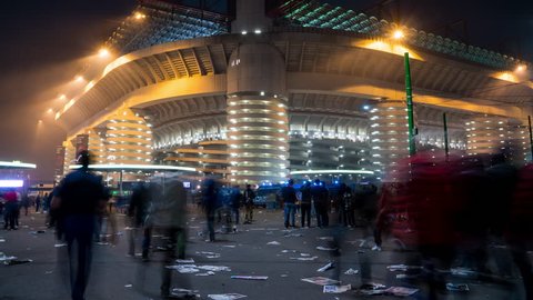 Milan, Italy - October 15, 2017: Supporters of Milan and Inter soccer clubs go to the Meazza stadium, also known as San Siro, in the evening of the big match between the two city teams.