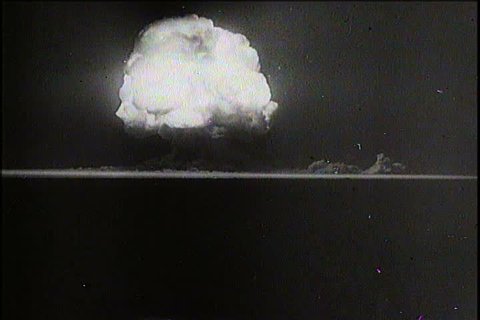 CIRCA 1940s - Atomic bomb test footage, including great footage of the dreaded mushroom cloud, as well as a look at the town of Oak Ridge, Tennessee, which was established as a production site