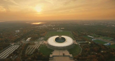 BERLIN, GERMANY - OCTOBER 18, 2017: Sunset view of the Olympia Stadium, built for the 1936 Summer Olympics. Taken from the top of the tower in the Olympic Park. Berlin, Germany