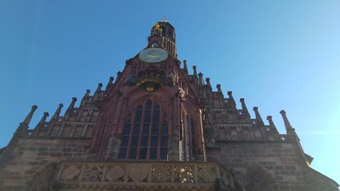 a huge lens flare outside of a church in nuremberg germany