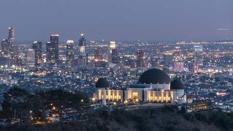 Downtown Los Angeles and Griffith Park dusk to night time lapse with pan.