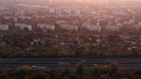 Sunset over the dense smog in Tatabanya, a Hungarian mining city located in the northern part of the country - drone video