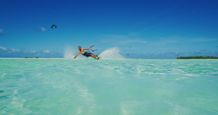 Kitesurfing on tropical island with amazing blue water Royalty-Free Stock Footage #31987945