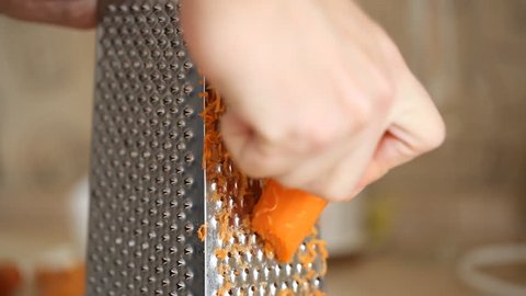 Carrot grating on metal grater