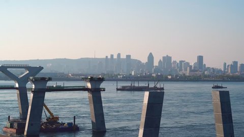 MONTREAL, CANADA - SEPTEMBER 2017: Downtown City Skyline & Construction of The New Champlain Bridge