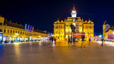 NOVI SAD, SERBIA - MAY 22: Time-lapse view on the center of the city at night as People pass by on May 22, 2017 in Budapest, Hungary.
