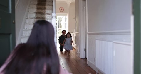 Girl running to welcome Mum home