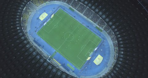 aerial survey. Kiev-Olympic Stadium October 9, 2017. World Cup. Ukraine-Croatia. cityscape time of day night. The view from the top to the illuminated stadium with games and fans.

