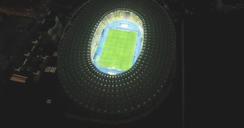 aerial survey. Kiev-Olympic Stadium October 9, 2017. World Cup. Ukraine-Croatia. cityscape time of day night. The view from the top to the illuminated stadium with games and fans.