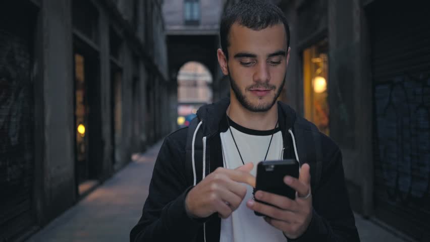 Looking at the cellphone on a street at night image - Free stock photo - Public Domain photo ...