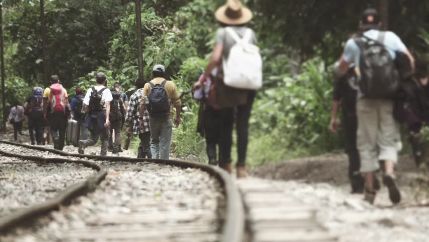 People walking to cross the american border to pursue the american dream on a summer day Royalty-Free Stock Footage #32036854