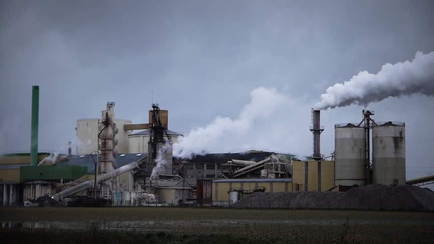 Industrial panorama with smoke and clouds in France.