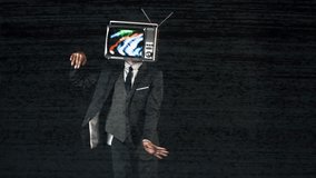 mr tv head. cool man in a suit dancing with a television as a head. the tv is has video static and noise playing on it.