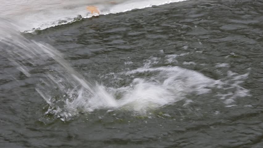 water flows into pond