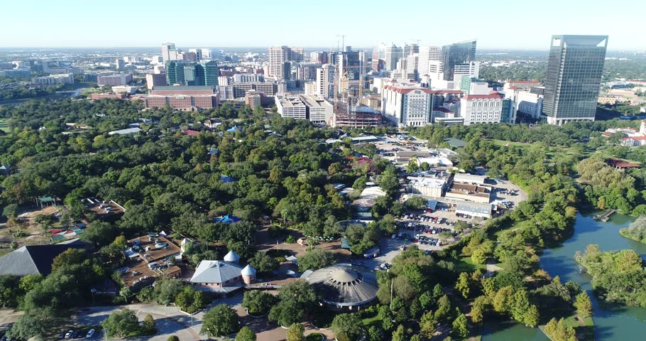 High quality 4k video footage of aerial view in Herman Park, Houston zoo and Medical center at Downtown Houston, Texas