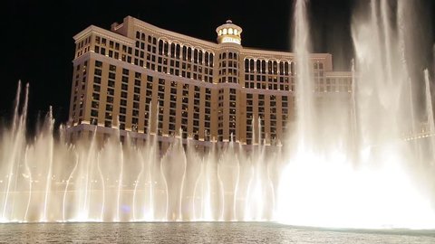 Las Vegas, Nevada - April 2017: Fountains at Bellagio Hotel and Casino in Las Vegas. Bellagio fountain water show at night. Bellagio water fountain show in Las Vegas with original surround sound.