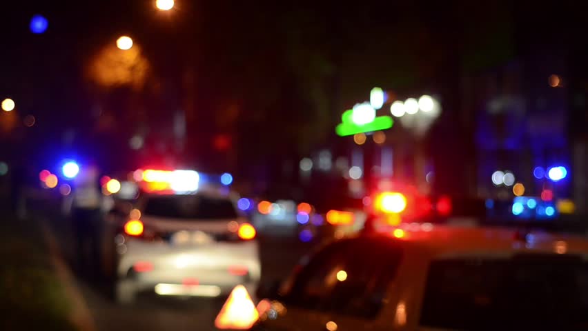 Blurred Police emergency lights flash at night. Car accident Royalty-Free Stock Footage #32122279