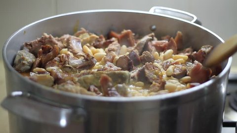 Cooking pork with white beans