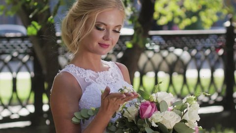 portrait of a bride close-up on wedding day. walk in the park – Stockvideo