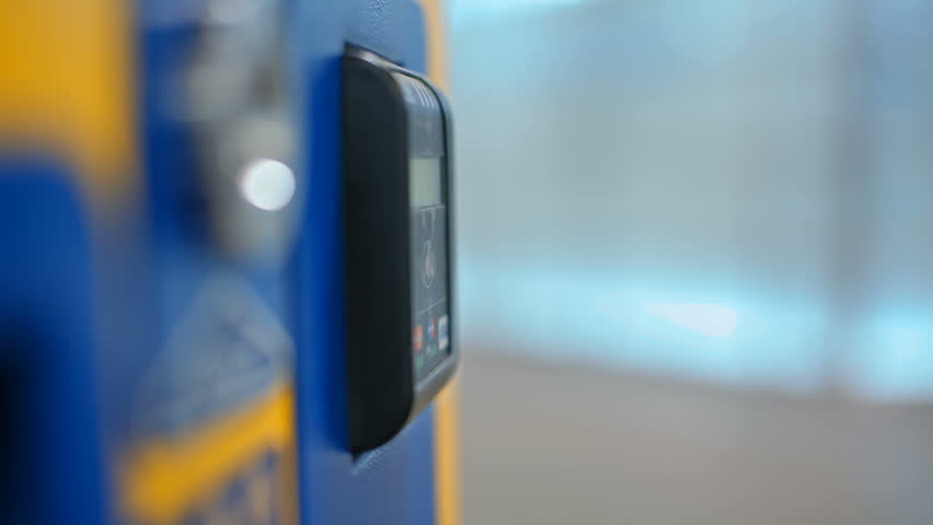 CloseUp of Paying by a Credit Card using Paypass Reader on a Ticket Vending Machine with Terminal Royalty-Free Stock Footage #32155621