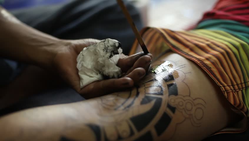CHANG, THAILAND - DEC 24: Unidentified master makes traditional tattoo with