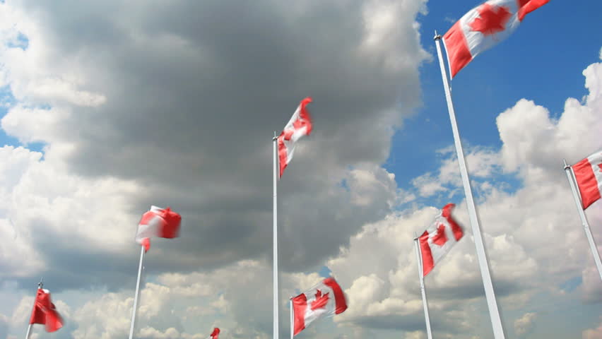 Canadian Flags Slo-Mo & Time-Lapse. Canadian flags in the wind, slow motion,