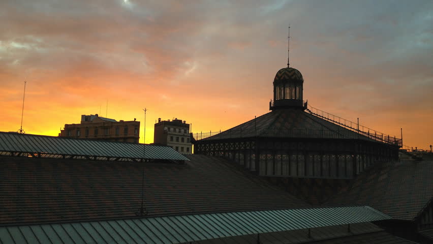 Rooftop of Born Market building illuminated at night