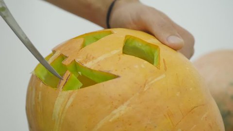 Carving jack o lantern pumpkin for Halloween