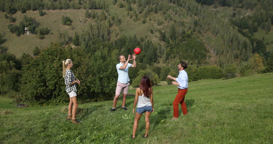 Energetic People Group Playing Volleyball Game Mountain Team Building Relaxation | Shutterstock HD Video #32168014