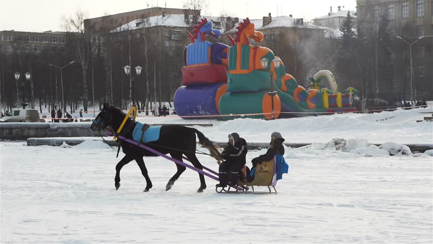 Horse running with sledge