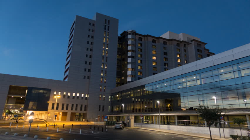 Health Care Modern Hospital Exterior Building. Day to night Time Lapse