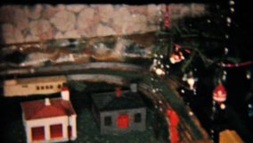 A cool clip of a model railroad zipping around under the Christmas tree - 1958 Vintage 8mm film.