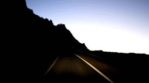 Driving in balearic islands, Spain at dusk. Amazing timelapse with long exposure power lines. POV.