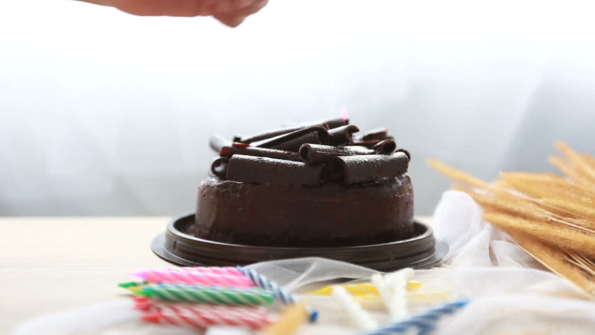 chocolate cake birthday with candles lights