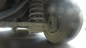 Car wheel spinning POV - Point of View, day country side in winter scene