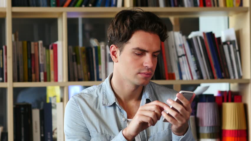 man-browsing-online-on-smartphone-stock-footage-video-100-royalty