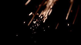 The Metal Sparks stock video clip has sow motion footage of metal sparks flying in the air over a black background. Drop it in and change its blending mode to remove the black background.