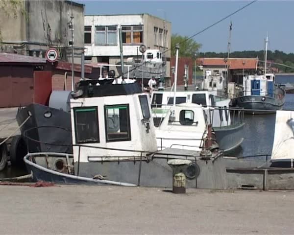 August 14 2005, Vyborg.  	 Fishing boats at a mooring.