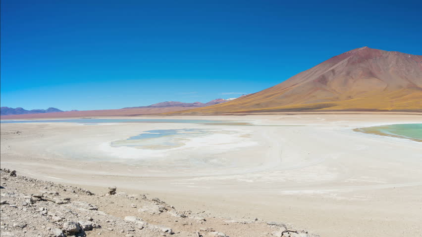 Laguna Verde Panorama, the Andes between Bolivia and Chile. The outstanding Green Lagoon, a frozen salt lake, travel destination in Bolivia. Snowcapped Licancabur Volcano, 5920 m.