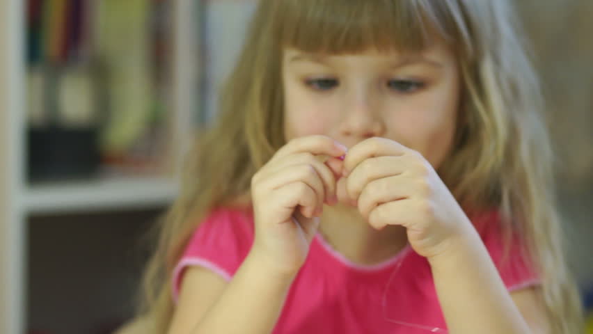 Child develops motor skills finger 