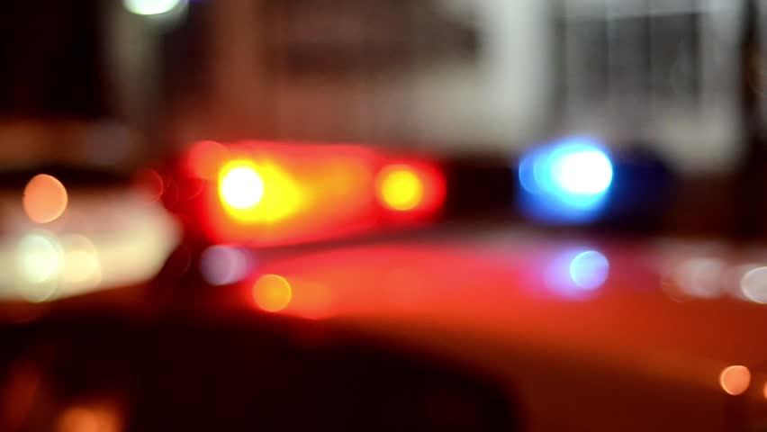 Police emergency lights flash at night. Car accident. Crime scene. Blurred. Royalty-Free Stock Footage #32245255