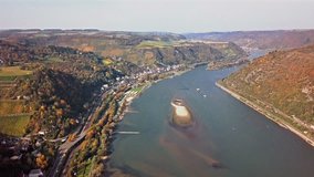 Time lapse flight over autumn Rhine valley near Bacharach town, Germany
