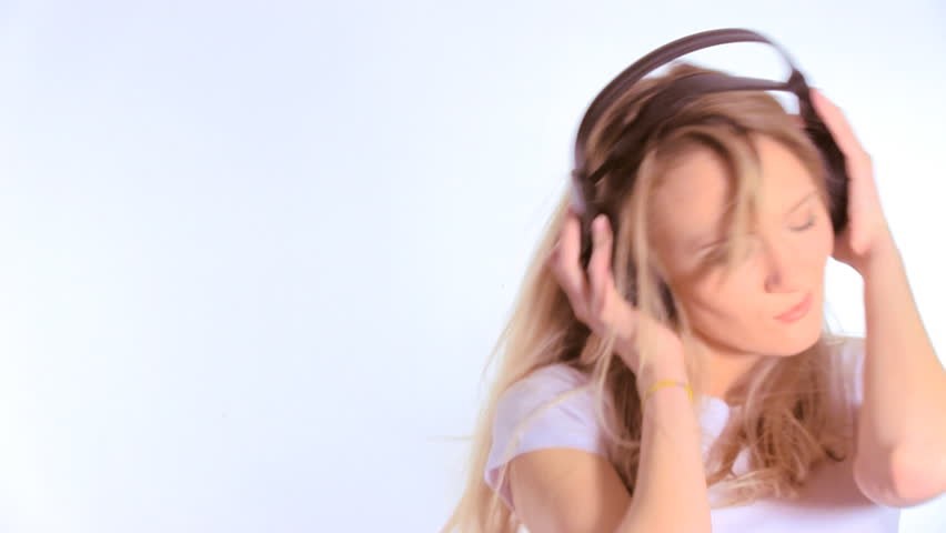 Beauty woman listening music in headphone