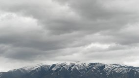 Cache Valley, Utah. USA. Time lapse video of turbulent clouds of spring rain storm.