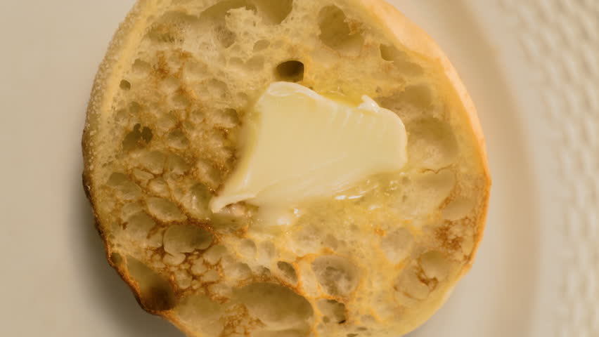 English Muffin Crumpets butter melting time-lapse  Royalty-Free Stock Footage #32286733
