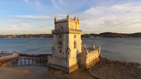 Lisbon, Portugal, aerial view of Belem Tower (Torre de Belem) by the Tagus river at sunset.