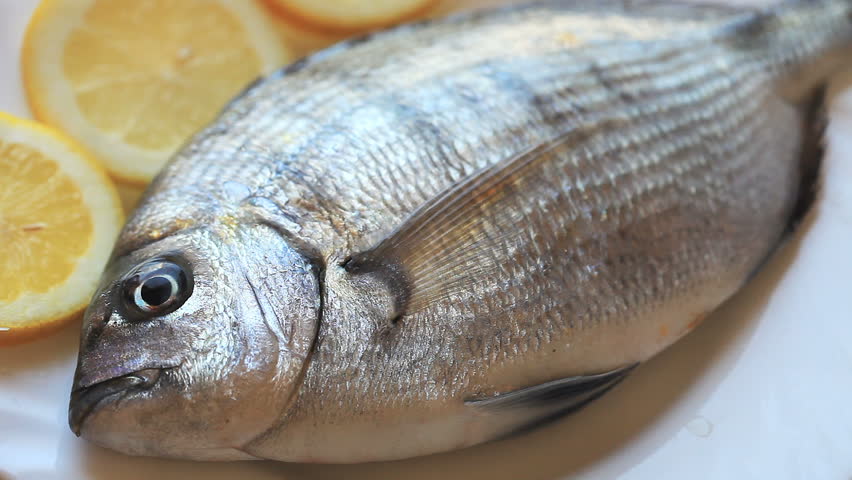 Preparation of fish with a lemon