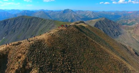 Group Of Hikers On Top Of Colorado Mountain Peak Trail - Rotating Aerial View Of Ridgeline - Mount Elbert, Colorado, USA - Symbolizing Success, Achievement, Accomplishment
