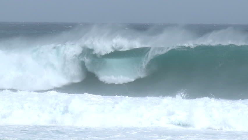 Large Waves Surf Crash Ashore Ahead of Hurricane. Shot in full HD 1920x1080 30p