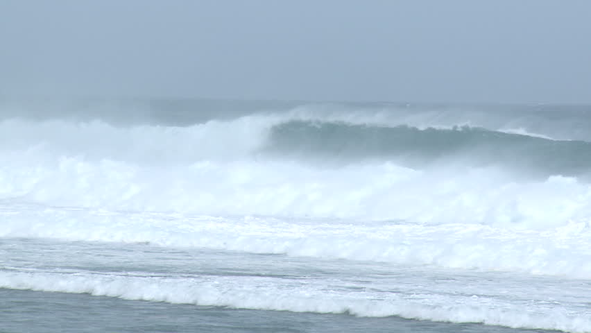 Large Waves Surf Crash Ashore Ahead of Hurricane. Shot in full HD 1920x1080 30p
